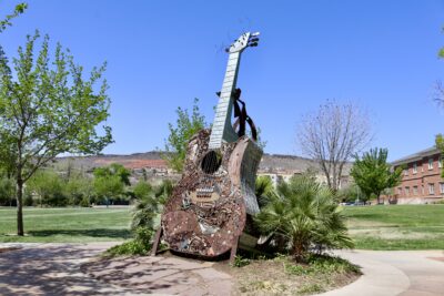 An art piece by Deveren Farley depicting a guitar sits in front of the children's museum at Town Square Park, April 17, 2022, St. George, Utah | Photo by Jessi Bang, St. George News