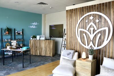 The front desk and common areas featured inside Trinity Wellness glow in the afternoon light, April 19, 2022, St. George, Utah | Photo by Jessi Bang, St. George News