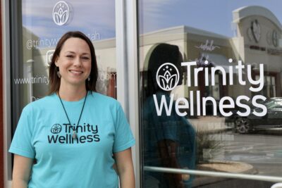 Katie Mitchell, founder of Trinity Wellness, stands outside her business, April 19, 2022, St. George, Utah | Photo by Jessi Bang, St. George News