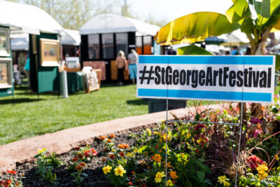 A sign stands in front of booths at a previous St. George Art Festival, Date unspecified, St. George, Utah | Photo Courtesy of David Cordero, St. George News