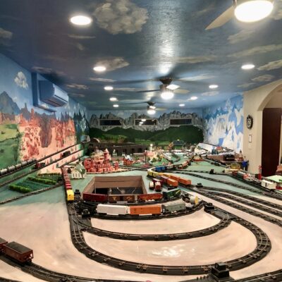 A mural painted in a train room by Ashlie Davenport features traintracks and outdoor scenery, location and date unspecified | Photo courtesy of Ashlie Davenport, St. George News