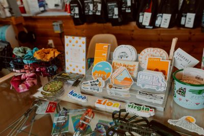 Stickers are available for purchase inside Amazing Adventures Gear Shop, La Verkin, date unspecified, Photo by Emmy Shaffer courtesy of Cindy Alfaro