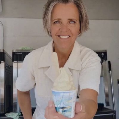 Mary Ludlow serves frozen yogurt at We Celebrate, location and date unspecified | Photo courtesy of Mary Ludlow, St. George News