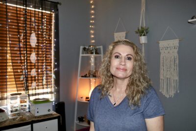 Jamie Tyler, Reiki Master and Esthetician, stands in her home studio, May 22, 2022, St. George News | Photo by Jessi Bang, St. George News