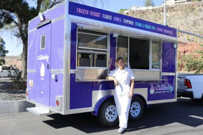 Mary Ludlow stands next to her We Celebrate yogurt truck, June 14, 2022 | Photo by Jessi Bang, St. George News