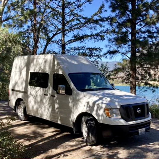 Artist Candice Larson's van stands by a lake, location and date not disclosed |  Photo by Kadis Larson, St. George News