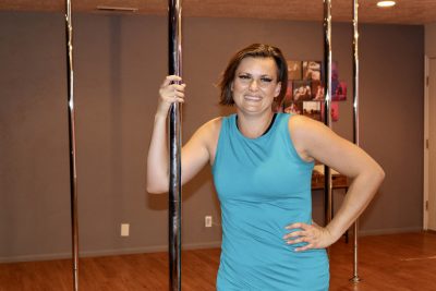 Jane Haynie smiles for the camera in her dance studio, June 29, 2022 | Photo by Jessi Bang, St. George News