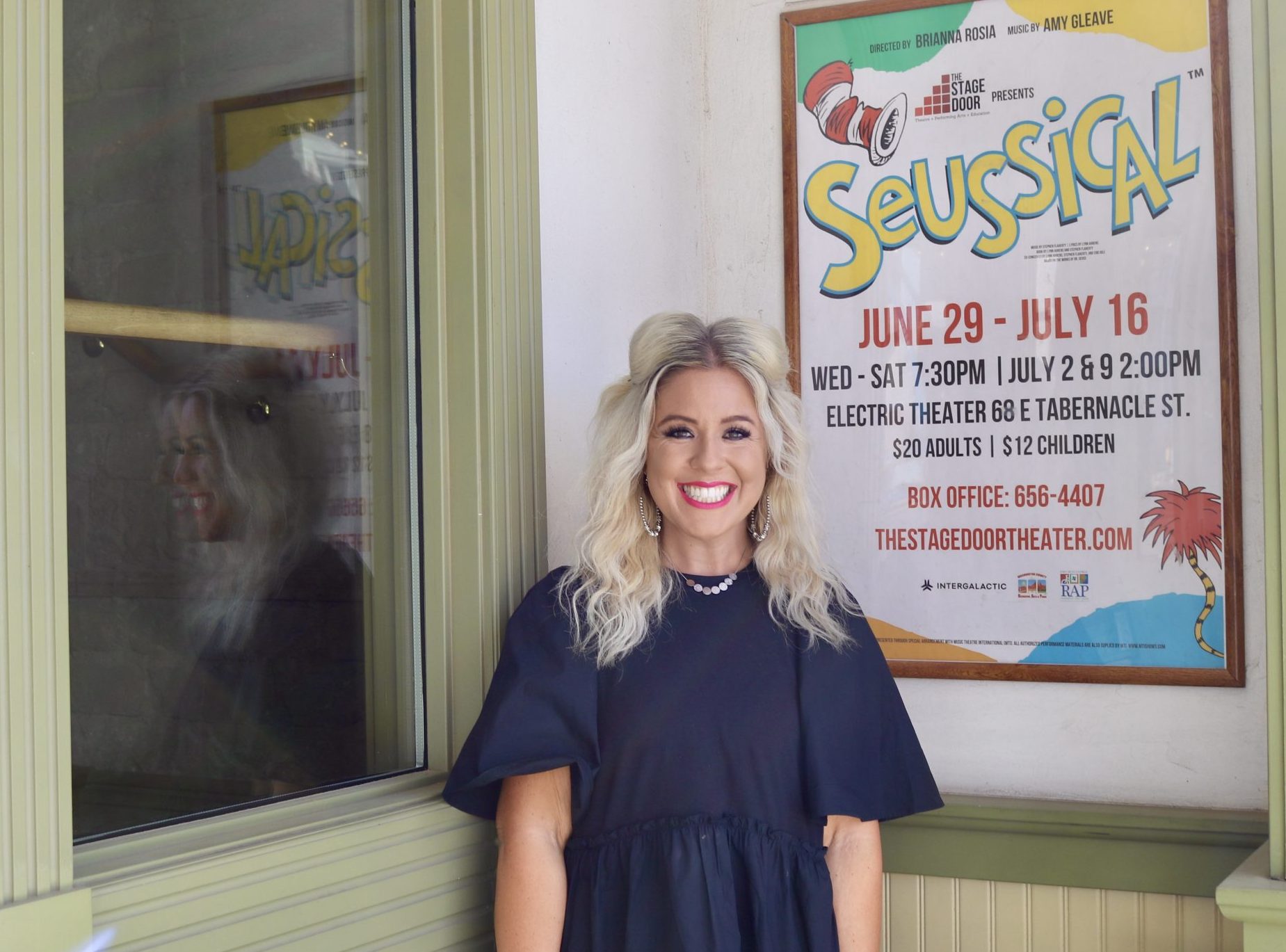 Brianna Rosia, director of "Seussical," proudly standing next to his musical flyer outside the Electric Theater, St. Louis.  George, Utah, July 13, 2022 |  Photo by Jessi Bang, St.  George News