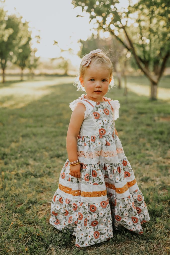 A girl wears a dress made by Love, Zola, place and date not specified |  Photo courtesy of Britta Foster by Cachet B Photography, St. George News