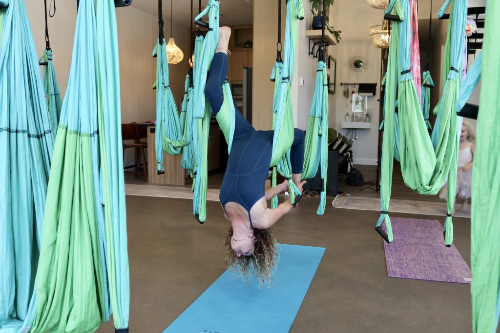 Kerry Ann Humphrey showcases yoga trapeze inside her business, Unity Health & Wellness, Hurricane, Utah, August 23, 2022 | Photo by Jessi Bang, St. George News