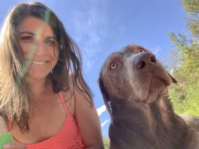 Andrea Tanzella and her dog Beau pose together, location and date unspecified | Photo courtesy of Andrea Tanzella, St. George News