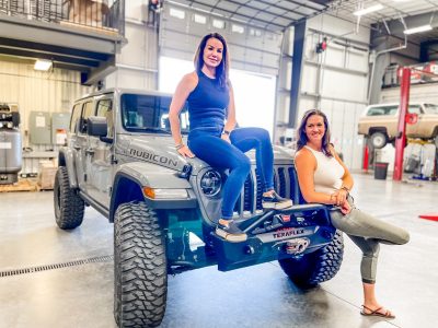 Teammates Avis Cook and Tara Thompson pose with the Jeep they will be competing in, location and date unspecified | Photo courtesy of Tara Thompson, St. George News