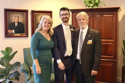 (L-R) Owner and Funeral Director Jody Spilsbury-Snow poses with her son Raycen Snow and father Ted Spilsbury, St. George, Utah, Oct. 12, 2022 | Photo by Jessi Bang, St. George News