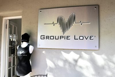 Groupie Love sign and apparel are shown outside the shop in Ancestor Square, St. George, Utah, Oct. 26, 2022 | Photo by Jessi Bang, St. George News