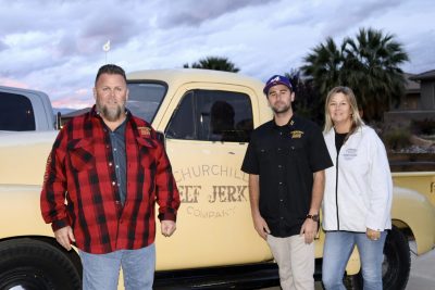 (L-R) Sean Churchill, Tyler Churchill and Rachel Churchill pose in front of their 1952 chevy truck branded with their company name, Washington, Utah, Nov. 2, 2022 | Photo by Jessi Bang, St. George News