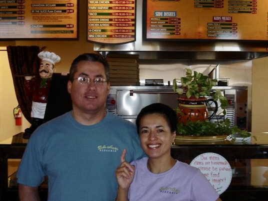 Marie Perez and Richard Doerr, co-owners of Bella Marie's Pizzeria and Restaurant, were photographed together on the opening day of the St. George restaurant in 2009.Photo credit: Marie Perez, St. George News