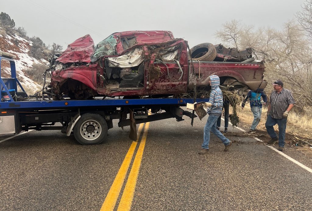 Crash south of Garrett leaves truck on top of car, sends 2 to hospital