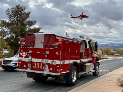 A Life Flight helicopter prepares to land in the Ivins roadway during the rescue of a fallen hiker, Ivins, Utah, Dec. 5, 2022 | Photo by Jessi Bang, St. George News