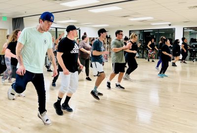 Attendees of Shelley Larsen's Zumba class are seen dancing, location and date unspecified | Photo courtesy of Shelley Larsen, St. George News