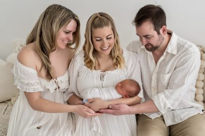 New parents Virginia and Jared Bassetti show their appreciation for surrogate Tassia Burgess and the birth of their baby boy, location and date unspecified | Photo courtesy of Virginia Bassetti, St. George News