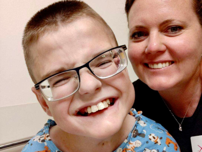 Corbin Kirkham takes a photo with his mom Stacy Mitchell, location and date unspecified | Photo courtesy of Stacy Mitchell, St. George News