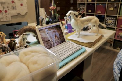 Debbie Hussey works on a wool sculpted dog at her home studio in St. George, Utah on March 22, 2023 | Photo by Jessi Bang, St. George News