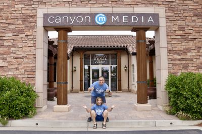 Husband and wife Mikey and Bonnie Foley take a photo together outside their new radio home at Canyon Media in St. George, Utah, May 25, 2023 | Photo by Jessi Bang, St. George News