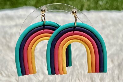 A pair of rainbow earrings by WOMIN Studio are pictured, location and date unspecified | Photo courtesy of Diana Smith, St. George News