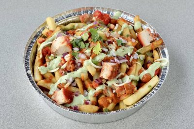 Masala fries from the Turmeric Indian Grill is topped with homemade sauces and more, location and date unspecified l Photo courtesy of Mandeep Jit, St. George News