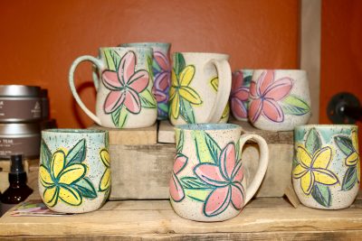 Pottery by Sun Lotus Designs feature tropical flowers inside MoFACo in downtown St. George, Utah, Aug. 2, 2023 | Photo by Jessi Bang, St. George News