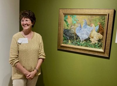 Kimberly Beck showcases her painting in Birds in Art, location unspecified, circa 2022 | Photo courtesy of Kimberly Beck, St. George News