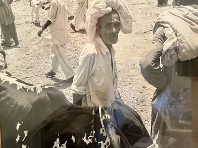 A photograph taken by Mary Manning features a trader in a stock market, which she took during her days as a journalist, Peshawar, Pakistan, date not specified | Photo courtesy of Mary Manning, St. George News