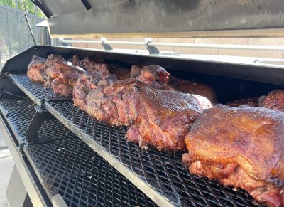 Barbecue by Joe Solomon sizzles on a smoker, location and date unspecified | Photo courtesy of Joe Solomon, St. George News