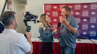 St. George News Reporter Jessi Bang interviews Marty Lane with 99.9 KONY Country during a press conference in St. George, Utah, April 24, 2024 | Photo courtesy of Aaron Crane, St. George News